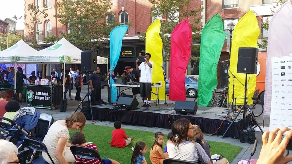 DJ DX performing on the Groove on Grove stage at the Grove Street PATH Plaza, Jersey City, August 2014