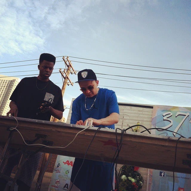 DJ DX on stage with a keyboard player at the Santacruzan Festival in Jersey City, 2015
